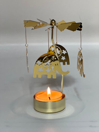 Spinning candle carousel - golden elephants with candle