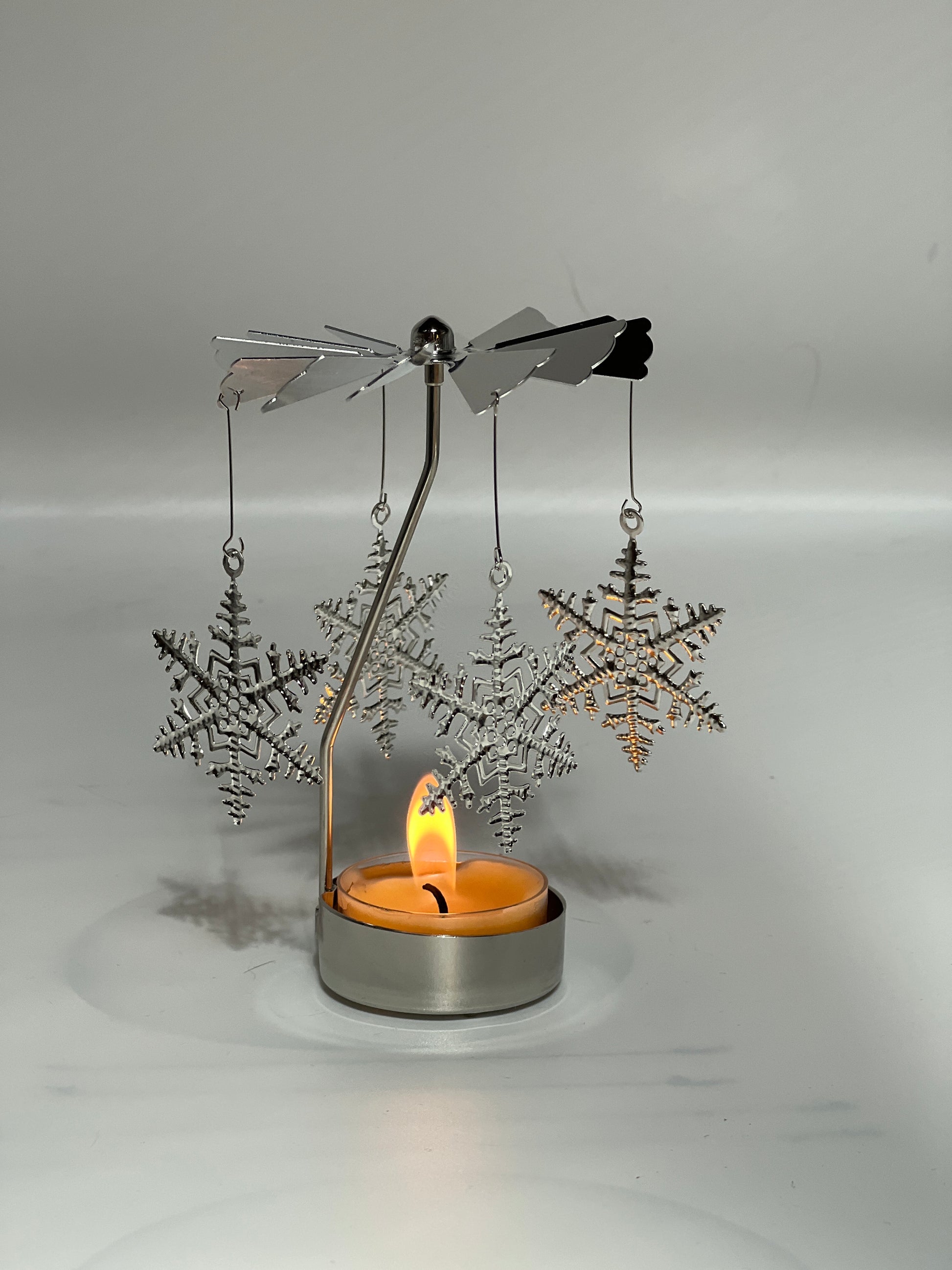 Spinning candle carousel - silver stars