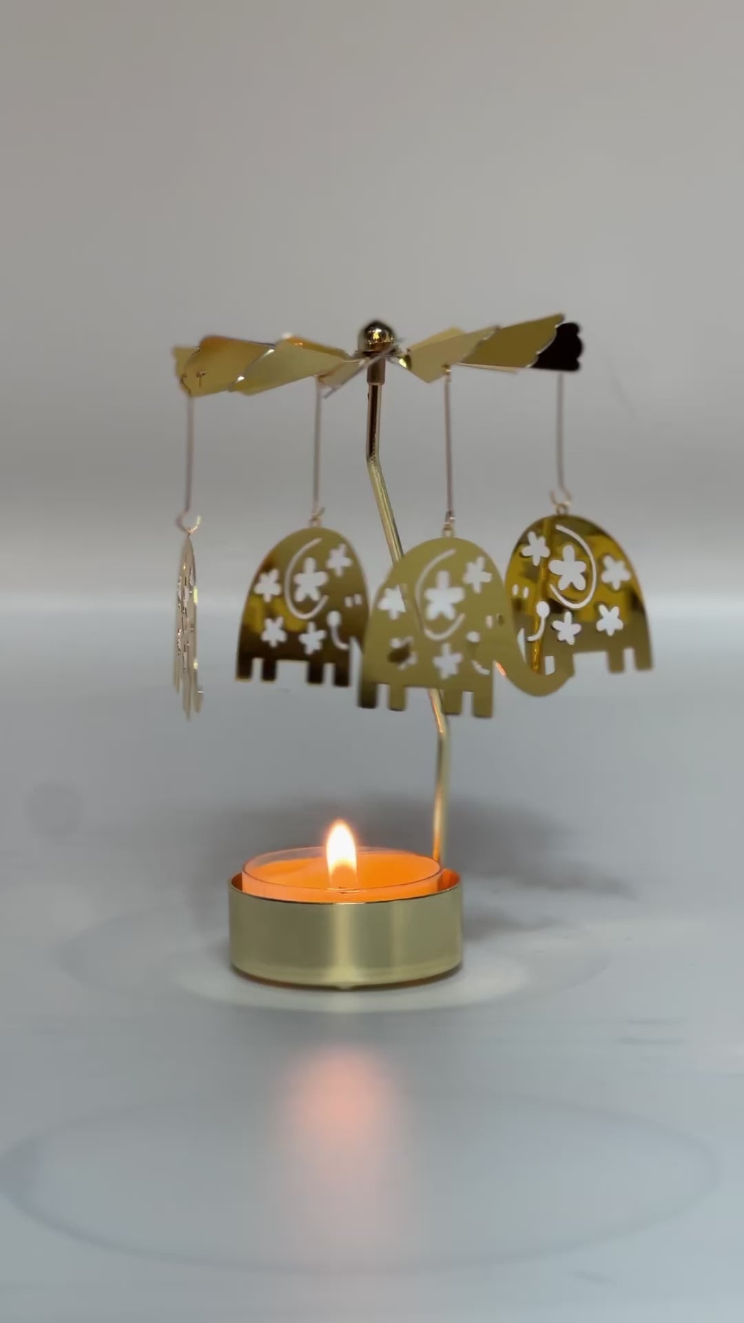 Spinning candle carousel - golden elephants with candle