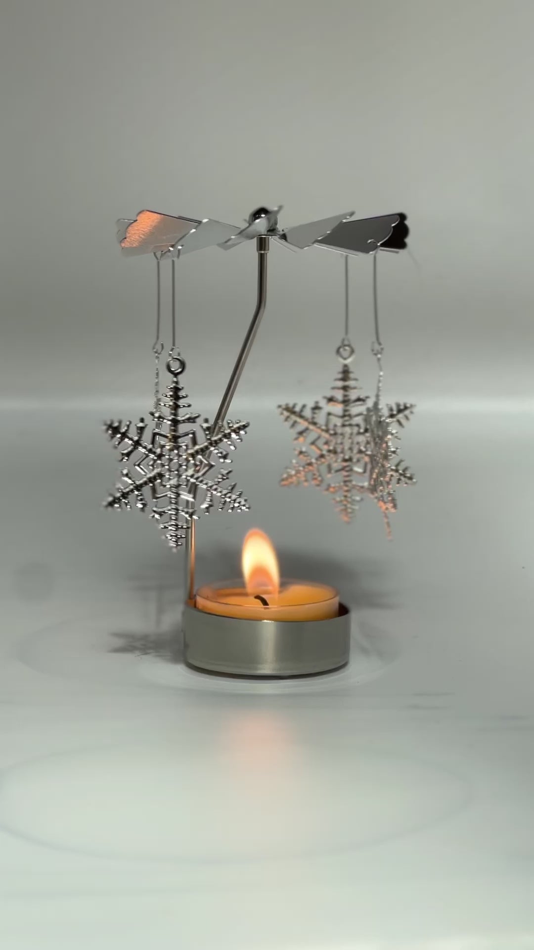 Spinning candle carousel - silver stars